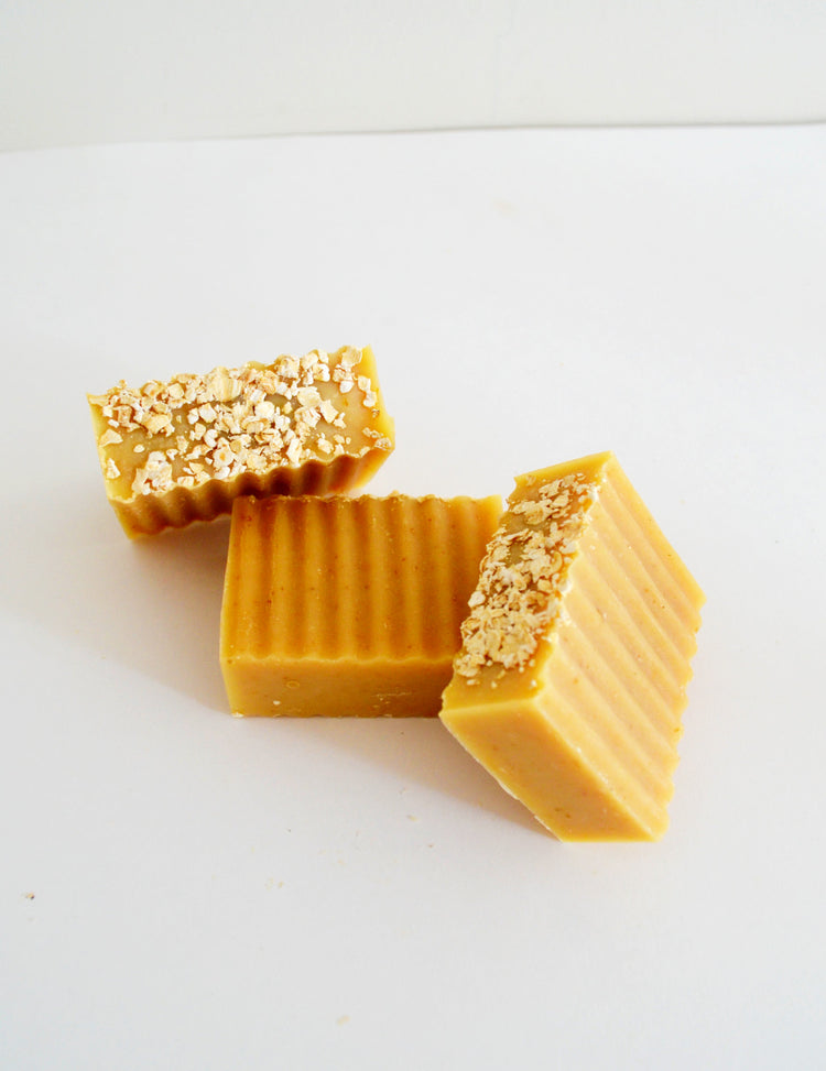 sliced bars of oatmeal and honey soap