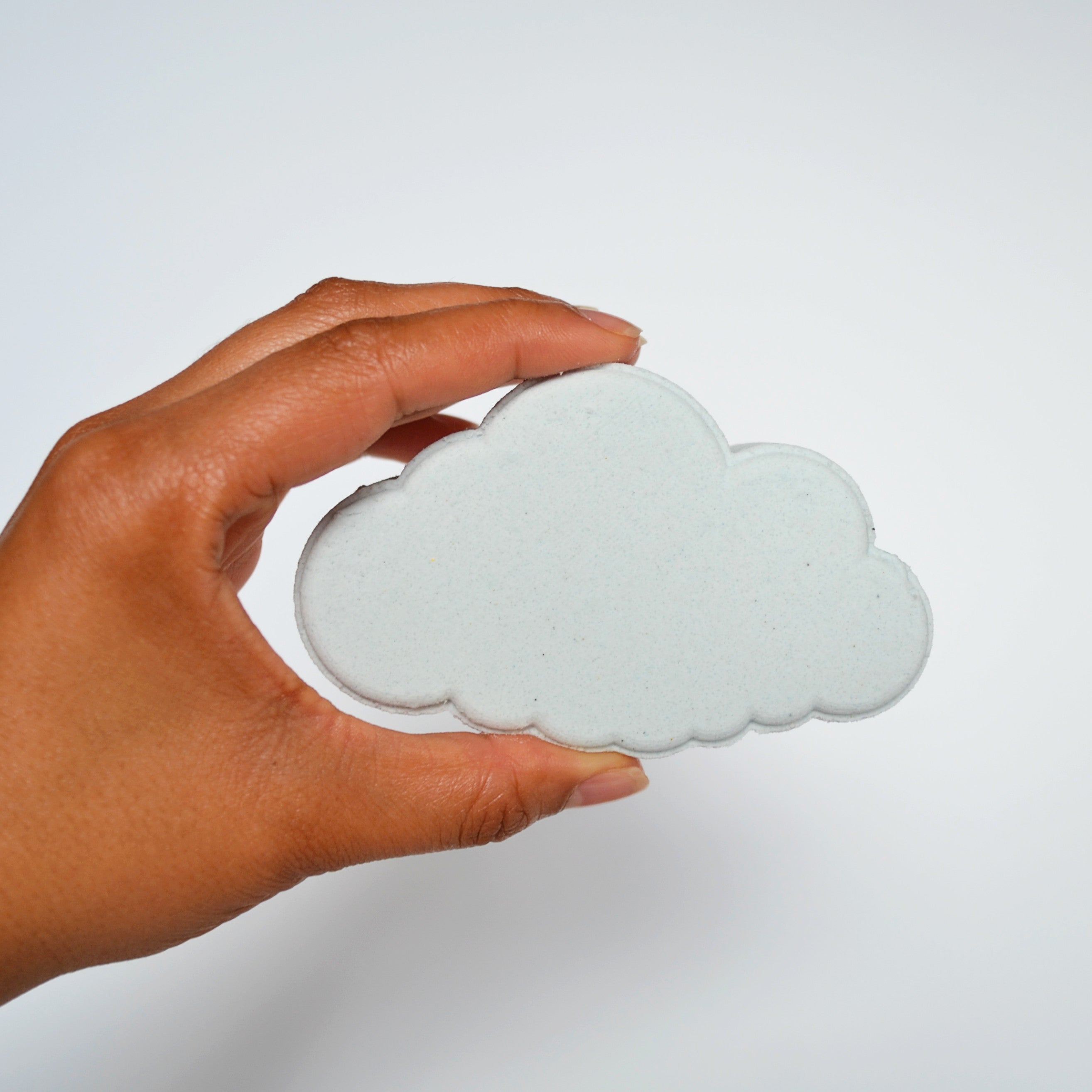 cloud shaped bath bomb on white background