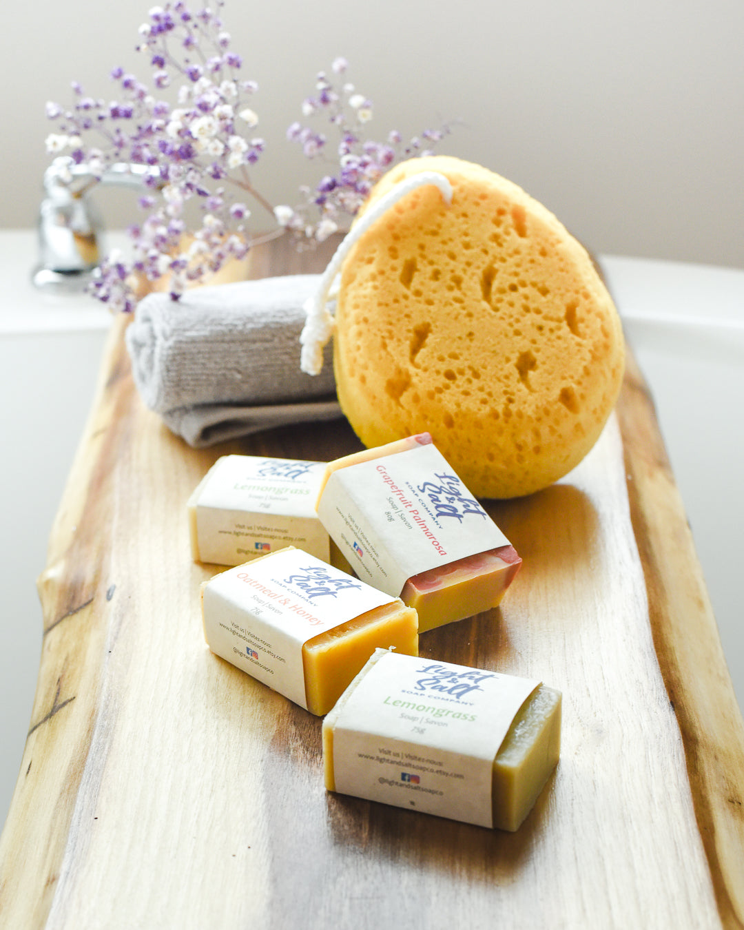 soap bars displayed over a bath tub
